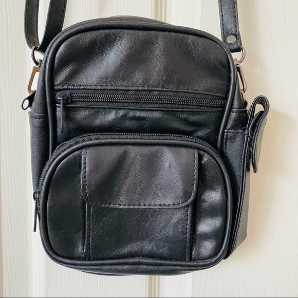 Handbags - NWOT Leather Crossbody.. Back is vegan leather. Front is Leather. ADORABLE